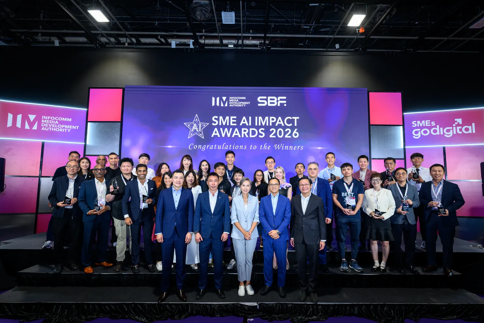 The SME AI Impact Awards 2026 winners on stage at SMEs Go Digital Day, 13 October 2026